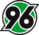 Ein schwarzes Logo mit der Nummer 96 auf einem grünen und weißen kreisförmigen Hintergrund.